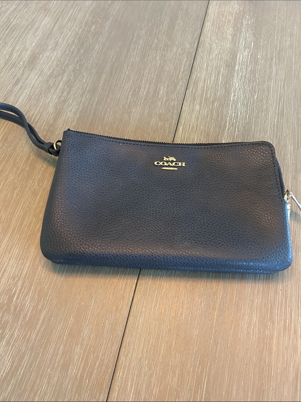 Coach Black Pebbled Leather Wristlet with Gold Logo 8 inches wide 5 inches tall